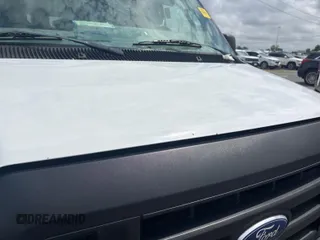 2014 Ford Econoline Cargo Commercial with VIN 1FTNE1EWXEDA41245, listed as a IAAI auction lot 42748315 with 291,956 mi miles and . Bid and sale history available at DreamBid. Image 12.