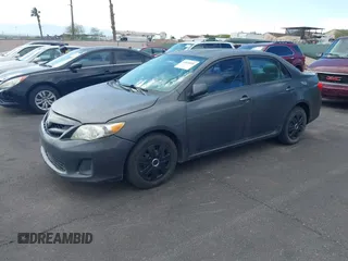 2011 Toyota Corolla L with VIN 2T1BU4EE9BC548192, listed as a IAAI auction lot 42036004 with 111,131 mi miles. Bid and sale history available at carsss.com. Image 2.