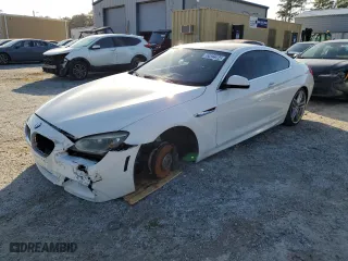 2012 BMW 6 Series 650i with VIN WBALX3C59CDV77427, listed as a Copart auction lot 82922384 with 139,827 mi miles and Clean Title. Bid and sale history available at carsss.com. Image 1.