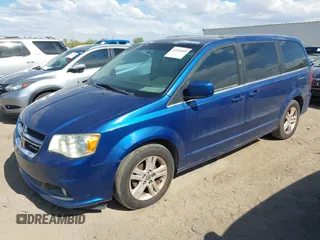 2011 Dodge Grand Caravan Crew with VIN 2D4RN5DG1BR711795, listed as a IAAI auction lot 42202899 with 185,524 mi miles and . Bid and sale history available at DreamBid. Image 2.