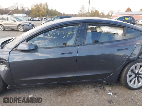 2021 Tesla Model 3 Long Range with VIN 5YJ3E1EB6MF975916, listed as a IAAI auction lot 40713749 with 29,593 mi miles and . Bid and sale history available at DreamBid. Image 13.