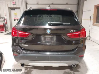 2016 BMW X1 xDrive28i with VIN WBXHT3C33GP886935, listed as a IAAI auction lot 41707367 with 73,201 mi miles. Bid and sale history available at carsss.com. Image 17.