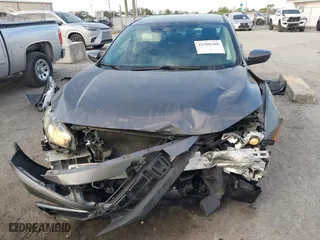 2019 Honda Civic Sedan LX with VIN 19XFC2F60KE018100, listed as a IAAI auction lot 41908486 with 124,357 mi miles. Bid and sale history available at carsss.com. Image 6.