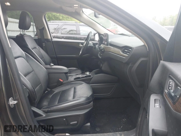 2020 Ford Escape Titanium with VIN 1FMCU9J96LUA00564, listed as a IAAI auction lot 42261152 with 73,748 mi miles and . Bid and sale history available at DreamBid. Image 5.