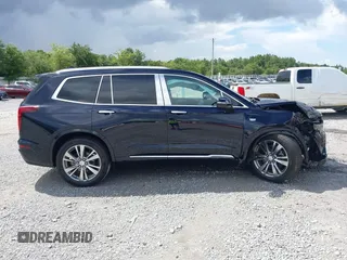 2022 Cadillac XT6 Premium Luxury with VIN 1GYKPCRS4NZ145145, listed as a IAAI auction lot 42533642 with 36,450 mi miles and . Bid and sale history available at DreamBid. Image 13.