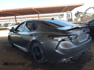 2021 Toyota Camry XSE z VIN 4T1K61AK7MU518176, wystawiony jako IAAI lot #42121890 z przebiegiem 70 634 mil mil oraz . Historia ofert i sprzedaży dostępna na DreamBid. Obrazek 3.
