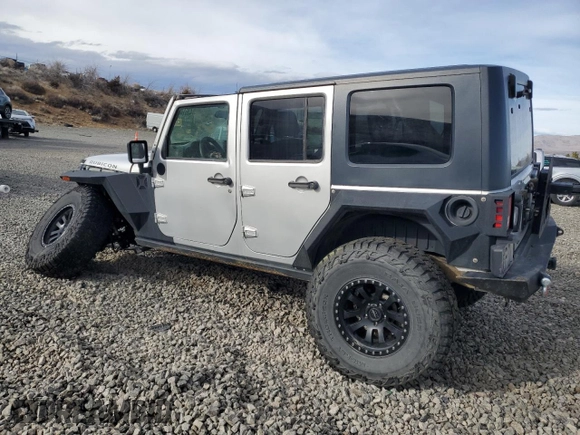 2009 Jeep Wrangler Unlimited Rubicon with VIN 1J8GA69139L703848, listed as a Copart auction lot 43614645 with 172,801 mi miles and Salvage title. Bid and sale history available at DreamBid. Image 2.