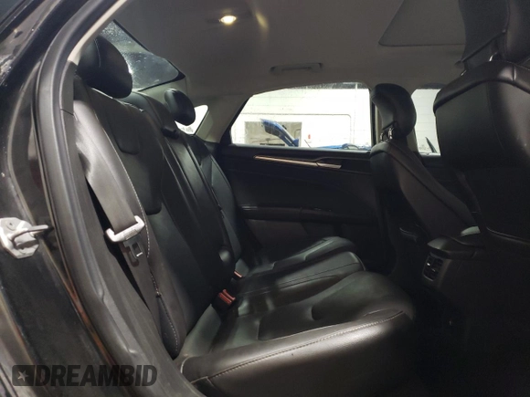 2014 Ford Fusion Titanium с VIN 3FA6P0K98ER304398, выставлен на аукционе Copart как лот 61048165 с пробегом 160 077 миль миль и Чистый • Clean title. История ставок и продаж доступна на DreamBid. Изображение 10.