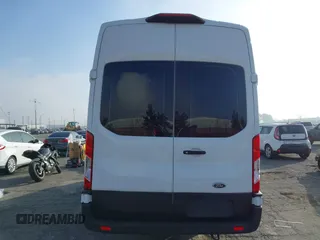 2021 Ford Transit Cargo z VIN 1FTBR3X82MKA18067, wystawiony jako IAAI lot #41205233 z przebiegiem 48 391 mil mil oraz . Historia ofert i sprzedaży dostępna na DreamBid. Obrazek 17.