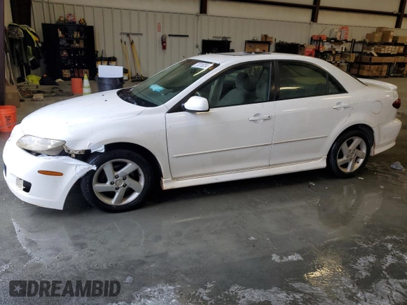 2004 Mazda 6 i with VIN 1YVFP80CX45N43521, listed as a Copart auction lot 73315234 with 182,697 mi miles and Salvage Title. Bid and sale history available at DreamBid. Image 1.