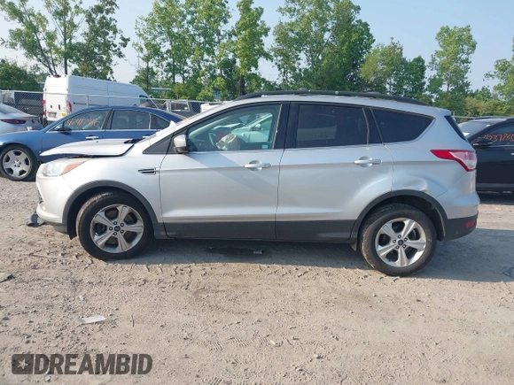 2014 Ford Escape SE with VIN 1FMCU9G96EUB25154, listed as a IAAI auction lot 42417612 with 176,916 mi miles and . Bid and sale history available at DreamBid. Image 14.