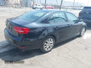 2015 Volkswagen Jetta SE z VIN 3VWD17AJXFM259306, wystawiony jako IAAI lot #42418042 z przebiegiem 199 780 mil mil oraz . Historia ofert i sprzedaży dostępna na DreamBid. Obrazek 4.