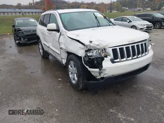 2012 Jeep Grand Cherokee Laredo with VIN 1C4RJFAG6CC297958, listed as a IAAI auction lot 40859811 with 213,499 mi miles. Bid and sale history available at carsss.com. Image 6.