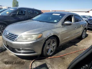 2013 Volkswagen CC Sport with VIN WVWBP7ANXDE532775, listed as a Copart auction lot 74339064 with 100,571 mi miles and Clean Title. Bid and sale history available at carsss.com. Image 1.