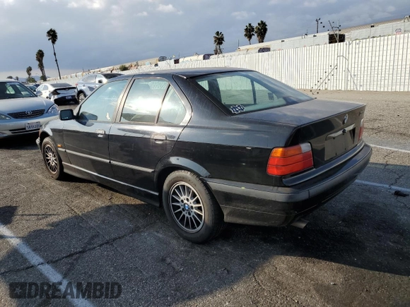 1997 BMW 3 Series 318i with VIN WBACC9327VEE58764, listed as a Copart auction lot 77671674 with 228,996 mi miles and Clean Title. Bid and sale history available at carsss.com. Image 2.