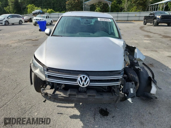2012 Volkswagen Tiguan S с VIN WVGAV7AXXCW606008, выставлен на аукционе Copart как лот 62232655 с пробегом 184 316 миль миль и Списание • Salvage title. История ставок и продаж доступна на DreamBid. Изображение 5.