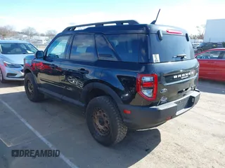 2023 Ford Bronco Sport Badlands z VIN 3FMCR9D95PRD26169, wystawiony jako IAAI lot #41723643 z przebiegiem 21 181 mil mil oraz . Historia ofert i sprzedaży dostępna na DreamBid. Obrazek 3.