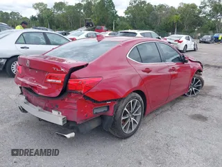 2019 Acura TLX with VIN 19UUB2F37KA003453, listed as a IAAI auction lot 40719757 with 98,628 mi miles and . Bid and sale history available at DreamBid. Image 4.