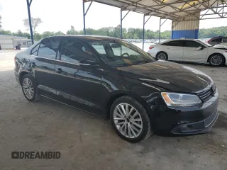 2012 Volkswagen Jetta SEL with VIN 3VWLX7AJ2CM409477, listed as a Copart auction lot 59476915 with 156,035 mi miles and Salvage title. Bid and sale history available at DreamBid. Image 4.