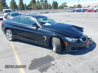 2015 BMW 4 Series 428i z VIN WBA3V7C53FP772066, wystawiony jako IAAI lot #42837150 z przebiegiem Nie podano mil oraz . Historia ofert i sprzedaży dostępna na DreamBid. Obrazek 1.