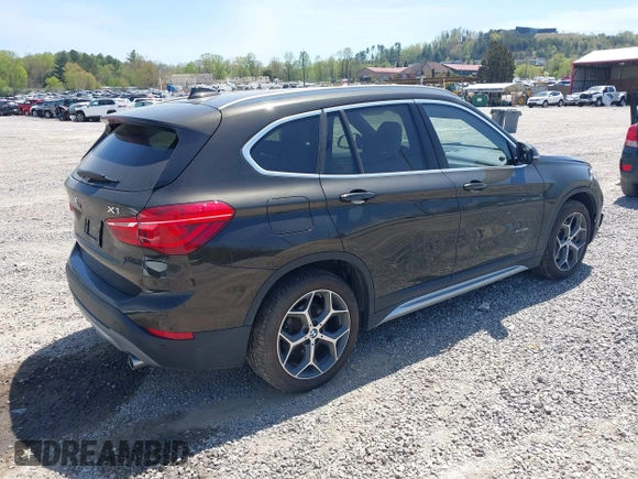 2018 BMW X1 xDrive28i with VIN WBXHT3C39J5F88234, listed as a IAAI auction lot 42044900 with 38,732 mi miles. Bid and sale history available at carsss.com. Image 4.