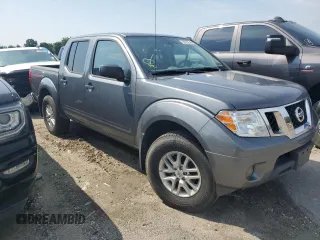 2019 Nissan Frontier Pro-4X with VIN 1N6AD0EVXKN873772, listed as a Copart auction lot 59573645 with 103,574 mi miles and Salvage title. Bid and sale history available at DreamBid. Image 4.