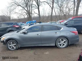 2015 Nissan Altima 2.5 S with VIN 1N4AL3AP4FC184462, listed as a IAAI auction lot 41185080 with 127,660 mi miles. Bid and sale history available at carsss.com. Image 14.