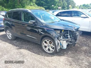 2018 Ford Escape Titanium z VIN 1FMCU9J94JUC98805, wystawiony jako IAAI lot #42718214 z przebiegiem 36 689 mil mil oraz . Historia ofert i sprzedaży dostępna na DreamBid. Obrazek 1.