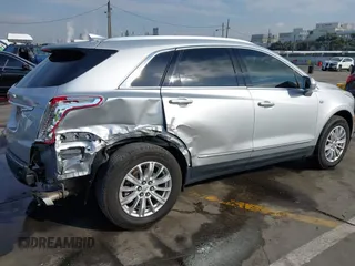 2017 Cadillac XT5 FWD with VIN 1GYKNARS7HZ144148, listed as a IAAI auction lot 41392399 with 96,252 mi miles and . Bid and sale history available at carsss.com. Image 6.