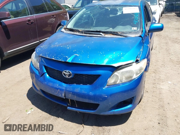 2009 Toyota Corolla with VIN 2T1BU40E69C167904, listed as a IAAI auction lot 42206415 with 201,694 mi miles. Bid and sale history available at carsss.com. Image 6.