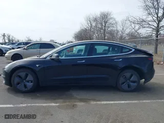 2019 Tesla Model 3 Long Range with VIN 5YJ3E1EB9KF359270, listed as a IAAI auction lot 41797235 with 65,722 mi miles. Bid and sale history available at carsss.com. Image 13.