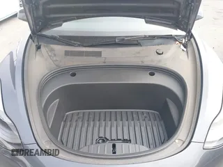 2023 Tesla Model 3 z VIN 5YJ3E1EA0PF577869, wystawiony jako IAAI lot #41468956 z przebiegiem 38 760 mil mil oraz . Historia ofert i sprzedaży dostępna na DreamBid. Obrazek 10.