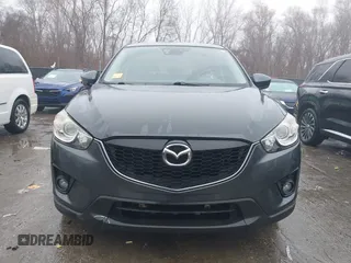 2014 Mazda CX-5 Grand Touring with VIN JM3KE4DY0E0392476, listed as a IAAI auction lot 41419144 with 89,245 mi miles and . Bid and sale history available at carsss.com. Image 12.