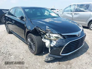 2016 Toyota Avalon Limited z VIN 4T1BK1EB7GU206739, wystawiony jako IAAI lot #42267483 z przebiegiem 131 930 mil mil oraz . Historia ofert i sprzedaży dostępna na DreamBid. Obrazek 1.
