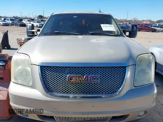 2007 GMC Yukon Denali z VIN 1GKFK63857J261948, wystawiony jako IAAI lot #41262362 z przebiegiem Nie podano mil oraz . Historia ofert i sprzedaży dostępna na DreamBid. Obrazek 6.