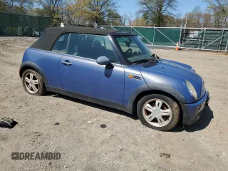 2006 MINI Convertible with VIN WMWRF33556TG14421, listed as a Copart auction lot 50090415 with 136,736 mi miles and Non repairable. Bid and sale history available at DreamBid. Image 4.