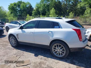 2013 Cadillac SRX Premium Collection with VIN 3GYFNEE33DS554556, listed as a IAAI auction lot 42152972 with 144,668 mi miles and . Bid and sale history available at DreamBid. Image 14.