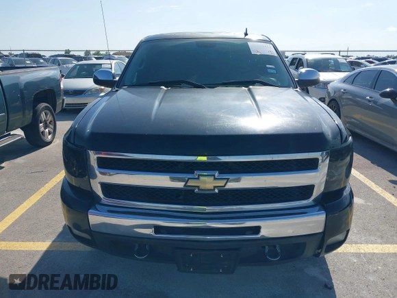 2011 Chevrolet Silverado 1500 LT with VIN 1GCRCSE05BZ408348, listed as a IAAI auction lot 42150412 with 300,795 mi miles and . Bid and sale history available at DreamBid. Image 12.