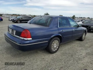 2004 Ford Police Interceptor Base w/3.27 Axle with VIN 2FAFP71W54X185452, listed as a Copart auction lot 57003145 with 159,532 mi miles and Clean title. Bid and sale history available at DreamBid. Image 3.