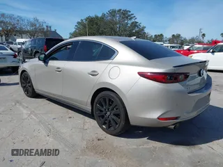 2023 Mazda 3 Premium Plus with VIN 3MZBPBEY3PM385377, listed as a IAAI auction lot 41478593 with 10,924 mi miles and . Bid and sale history available at DreamBid. Image 3.