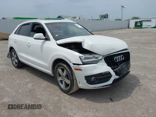 2015 Audi Q3 Premium Plus with VIN WA1EFCFS7FR006939, listed as a IAAI auction lot 42067797 with 97,663 mi miles and . Bid and sale history available at DreamBid. Image 1.
