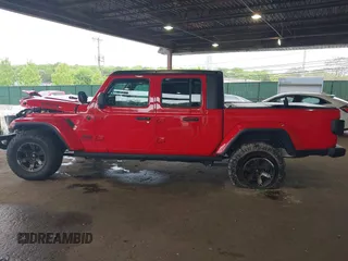 2021 Jeep Gladiator Willys z VIN 1C6HJTAG7ML602130, wystawiony jako IAAI lot #42161745 z przebiegiem 49 576 mil mil oraz . Historia ofert i sprzedaży dostępna na DreamBid. Obrazek 15.