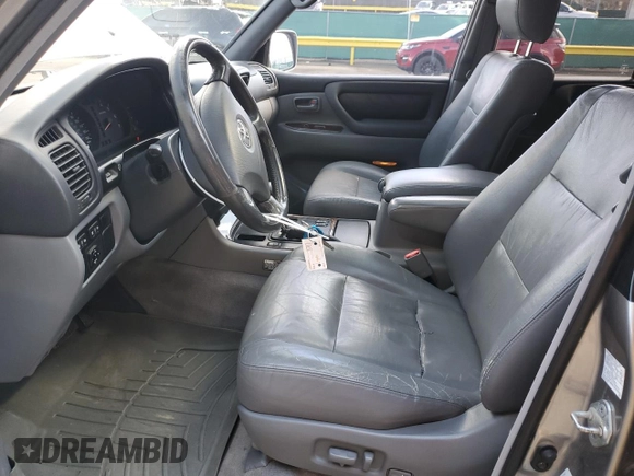 2002 Toyota Land Cruiser z VIN JTEHT05J522027452, wystawiony jako Copart lot #51141595 z przebiegiem 278 465 mil mil oraz Szkoda całkowita • Salvage title. Historia ofert i sprzedaży dostępna na DreamBid. Obrazek 13.
