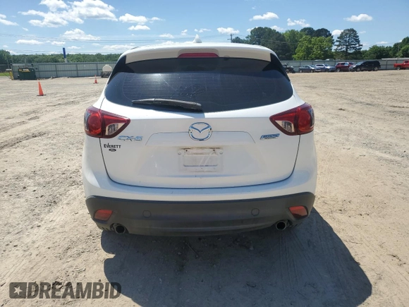2013 Mazda CX-5 Sport with VIN JM3KE2BE4D0109296, listed as a Copart auction lot 55575555 with 130,112 mi miles and Salvage title. Bid and sale history available at DreamBid. Image 6.