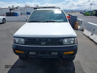 1996 Nissan Pathfinder XE z VIN JN8AR05Y1TW003648, wystawiony jako IAAI lot #41947783 z przebiegiem 224 612 mil mil oraz . Historia ofert i sprzedaży dostępna na DreamBid. Obrazek 6.