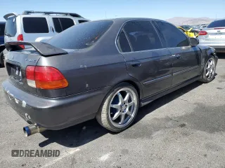 1998 Honda Civic LX with VIN 2HGEJ6673WH515915, listed as a Copart auction lot 52403795 with 224,174 mi miles and Salvage Title. Bid and sale history available at DreamBid. Image 3.