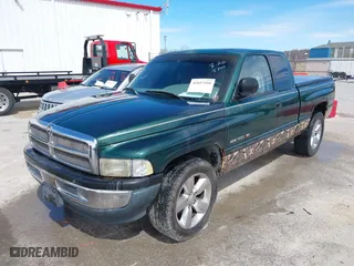 2000 Dodge Ram 1500 with VIN 1B7HC13Y0YJ119724, listed as a IAAI auction lot 41857558 with 173,330 mi miles. Bid and sale history available at carsss.com. Image 2.
