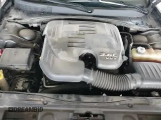 2019 Chrysler 300 Touring с VIN 2C3CCAAGXKH755813, выставлен на аукционе Copart как лот 69227755 с пробегом 99 980 миль миль и Чистый • Clean title. История ставок и продаж доступна на DreamBid. Изображение 13.