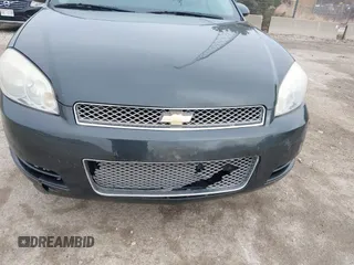 2014 Chevrolet Impala LS with VIN 2G1WA5E30E1125611, listed as a IAAI auction lot 41828292 with 141,826 mi miles and . Bid and sale history available at DreamBid. Image 6.