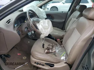 1999 Mercury Sable LS with VIN 1MEFM53U6XG646248, listed as a Copart auction lot 57859405 with 128,286 mi miles and Salvage title. Bid and sale history available at DreamBid. Image 7.